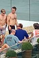 harry styles shirtless rio tossed in pool 02