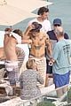 harry styles shirtless rio tossed in pool 05