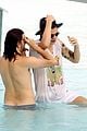 harry styles shirtless rio tossed in pool 07