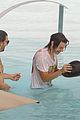 harry styles shirtless rio tossed in pool 08