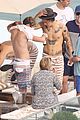 harry styles shirtless rio tossed in pool 13