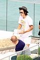 harry styles shirtless rio tossed in pool 15