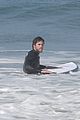 liam hemsworth surfs the waves with his brother luke03