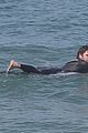 liam hemsworth surfs the waves with his brother luke08