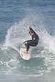 liam hemsworth surfs the waves with his brother luke09