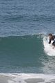 liam hemsworth surfs the waves with his brother luke10