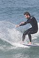 liam hemsworth surfs the waves with his brother luke12