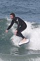 liam hemsworth surfs the waves with his brother luke15