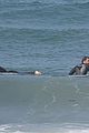 liam hemsworth surfs the waves with his brother luke20