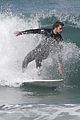 liam hemsworth surfs the waves with his brother luke21
