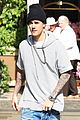 justin bieber attracts a mob of fans while out shopping 06