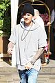 justin bieber attracts a mob of fans while out shopping 07