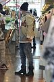 justin bieber attracts a mob of fans while out shopping 16