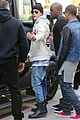 justin bieber attracts a mob of fans while out shopping 17