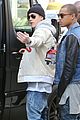 justin bieber attracts a mob of fans while out shopping 18