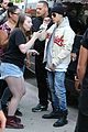 justin bieber attracts a mob of fans while out shopping 21