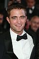 robert pattinson suits up nicely for the rover cannes premiere05