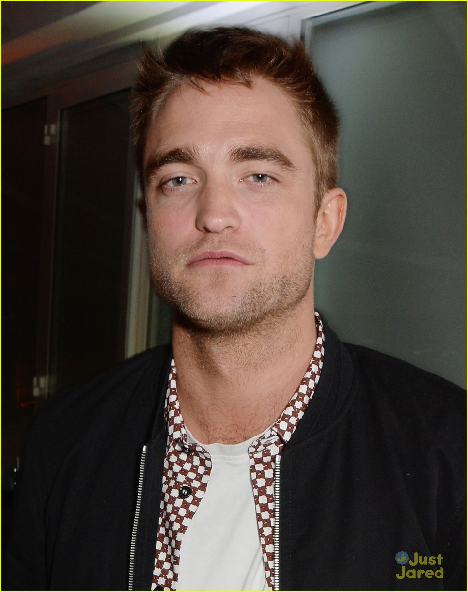 robert pattinson parties with hunger games stars in cannes 02