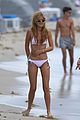 bella thorne hits the beach and shows off her bikini body02