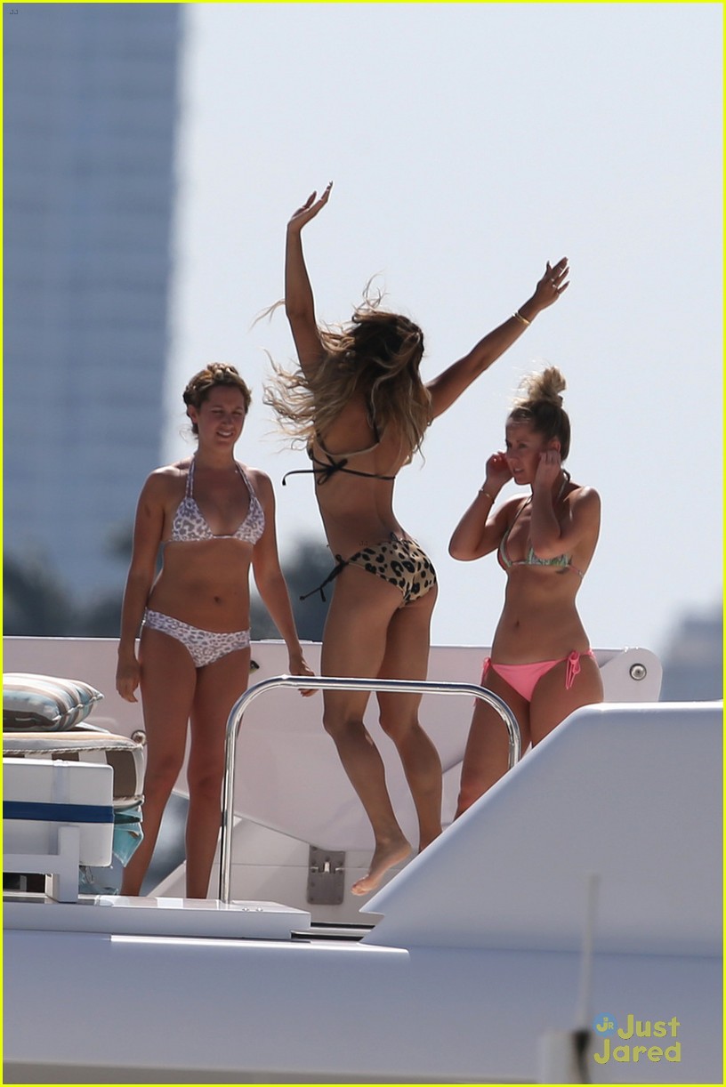 vanessa hudgens bares bikini on a yacht with ashley tisdale 03