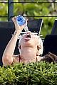 miley cyrus wears a bikini douses herself with water 15
