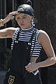 miley cyrus goes shopping after arriving home from europe 04