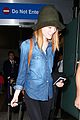 emma stone andrew garfield land in los angeles separately 02