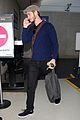 emma stone andrew garfield land in los angeles separately 07