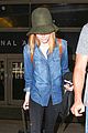 emma stone andrew garfield land in los angeles separately 17