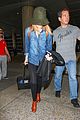 emma stone andrew garfield land in los angeles separately 21