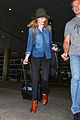 emma stone andrew garfield land in los angeles separately 22