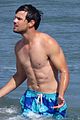 taylor lautner goes shirtless for run the tide beach scenes 03