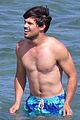taylor lautner goes shirtless for run the tide beach scenes 05