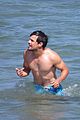 taylor lautner goes shirtless for run the tide beach scenes 31