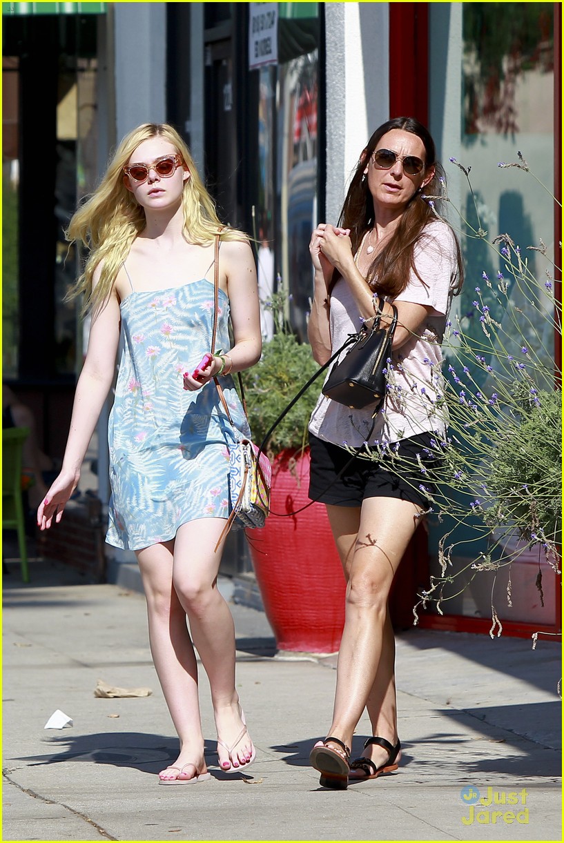 elle fanning switches casual chic outfits errands 36