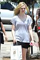 elle fanning switches casual chic outfits errands 11