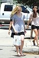 elle fanning switches casual chic outfits errands 16