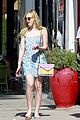 elle fanning switches casual chic outfits errands 39