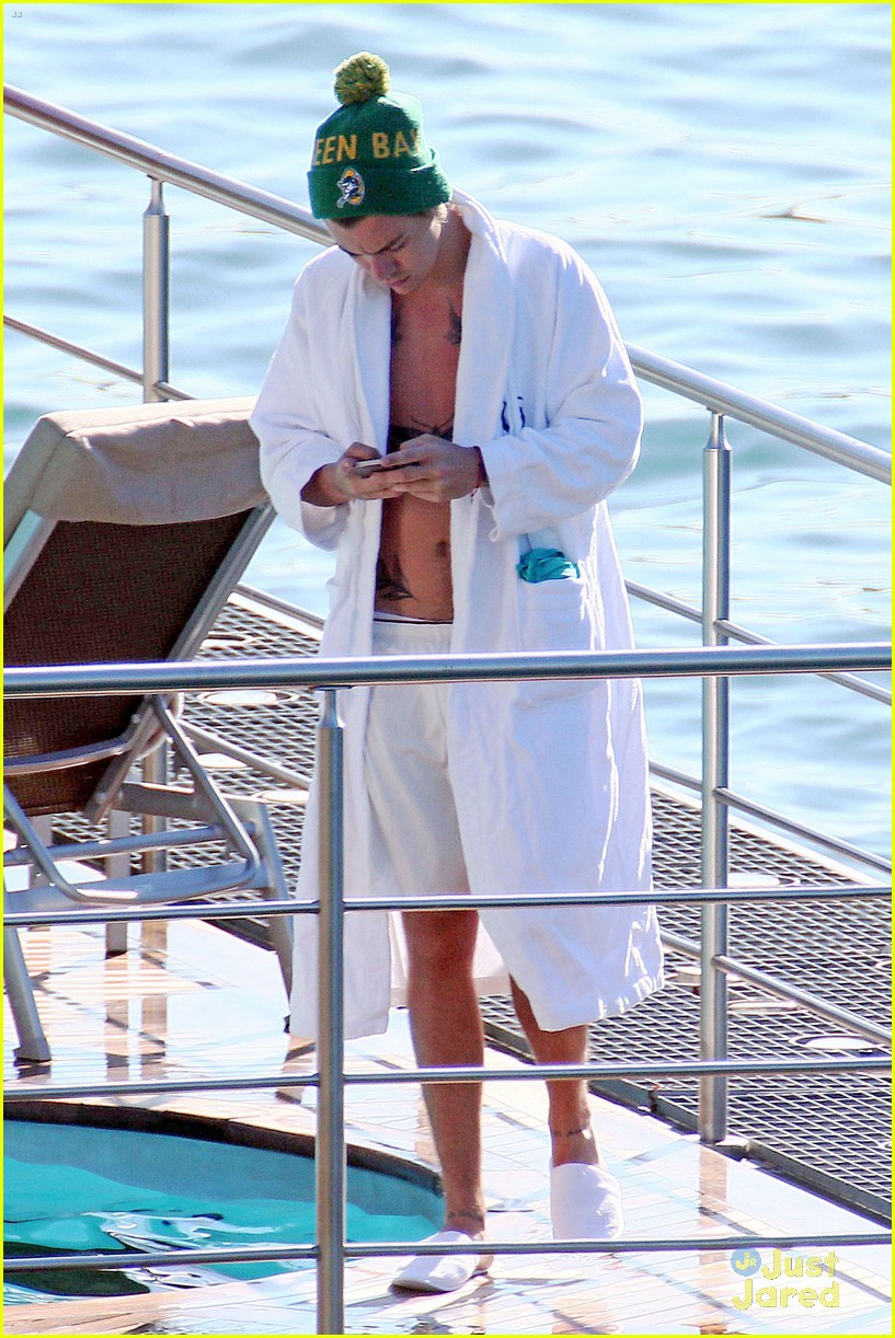 harry styles shirtless ponytail pool italy 02