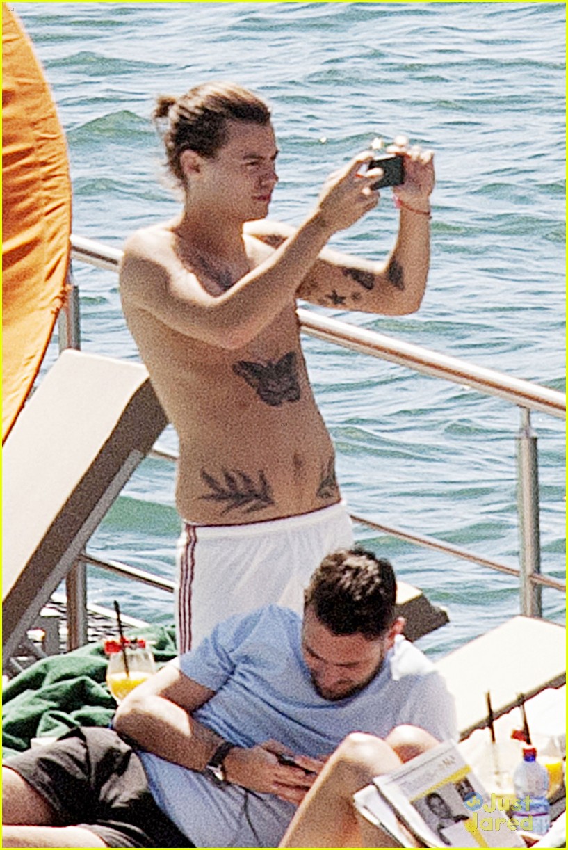 harry styles shirtless ponytail pool italy 05