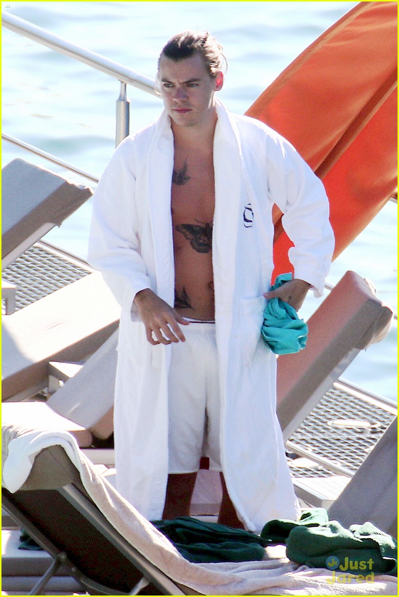 harry styles shirtless ponytail pool italy 07