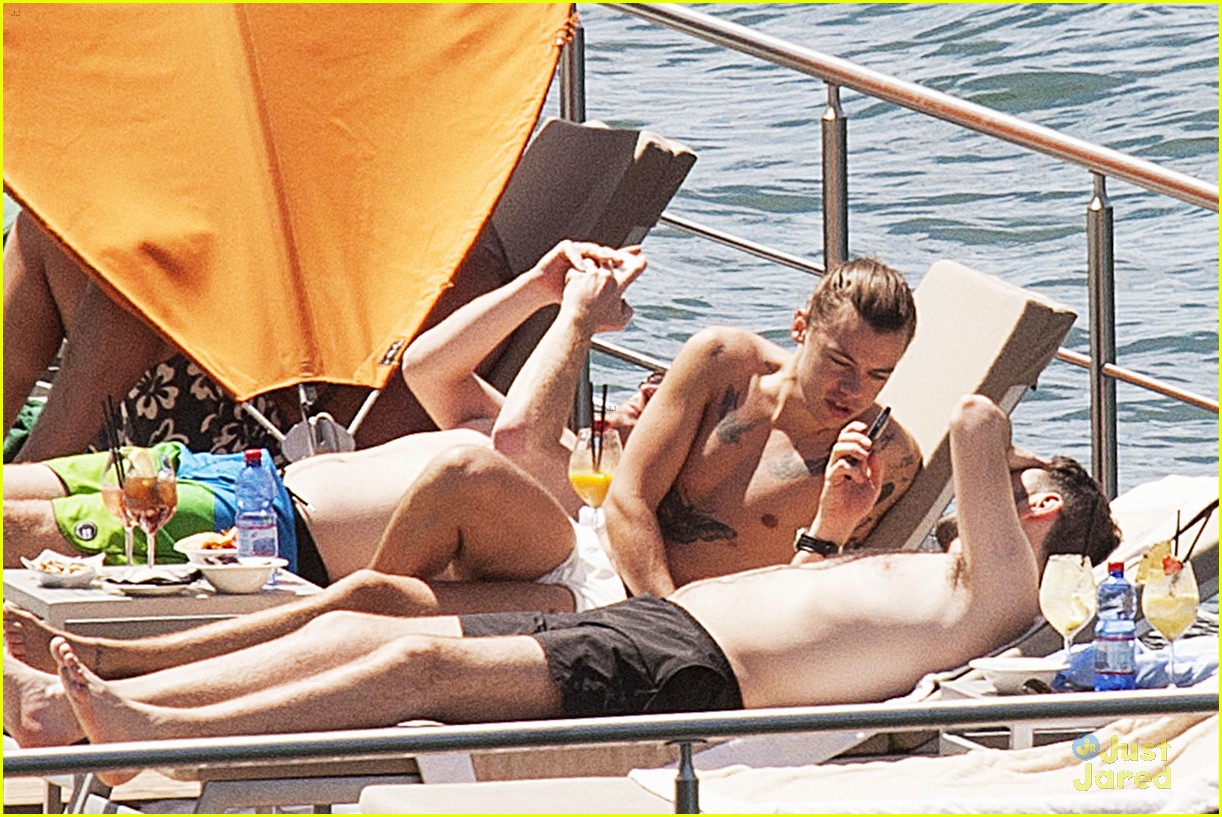 harry styles shirtless ponytail pool italy 13