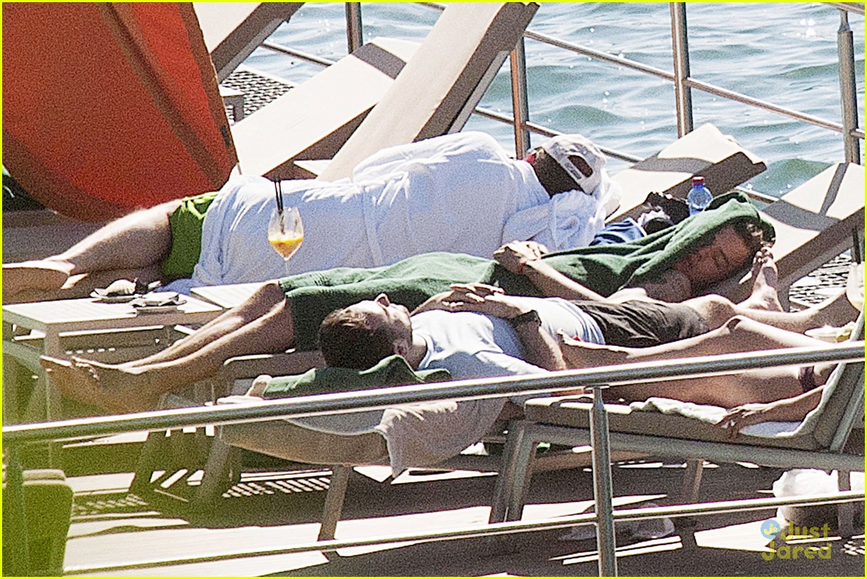 harry styles shirtless ponytail pool italy 24