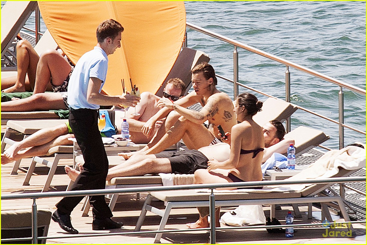 harry styles shirtless ponytail pool italy 30