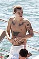 harry styles shirtless ponytail pool italy 06