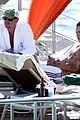 harry styles shirtless ponytail pool italy 08
