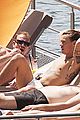 harry styles shirtless ponytail pool italy 15