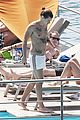 harry styles shirtless ponytail pool italy 17