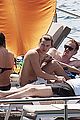 harry styles shirtless ponytail pool italy 23