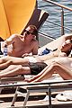 harry styles shirtless ponytail pool italy 29